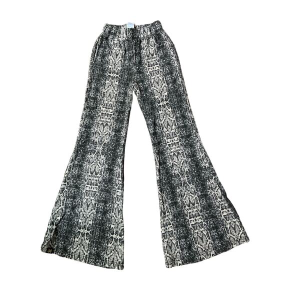 Dolls Kill Pants - Dolls kill Badee Ivory Black Python Mid Rise Wide Leg Flared Pants sz Medium